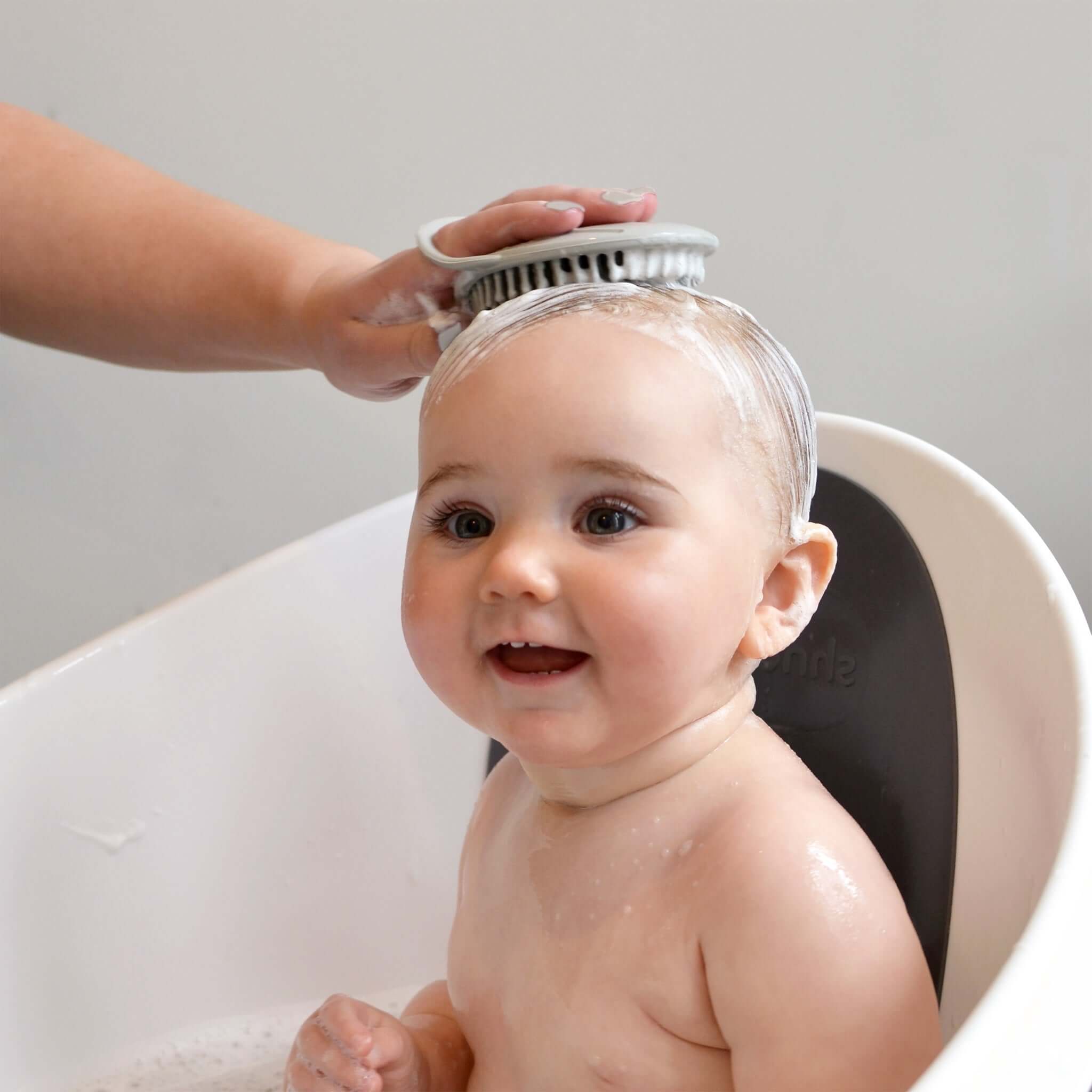 Bath brush used on baby